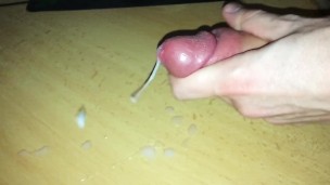 Pulling my foreskin and cumming hard in slow motion while massaging my frenulum