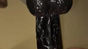 Twink using black dildo