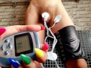 Dominatrix Nika electrocutes slave's dick and balls. Games with electricity. 13/16