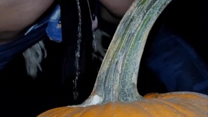 Public Pissing on a Pumpkin in the middle of the Road