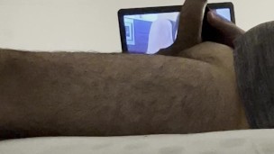 Giving pleasure to my big uncut cock on my bed