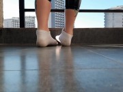 Dirty socks fetish, foot scent fetish, sock scent fetish. Dominatrix Nika puts her feet on the slave 3/16