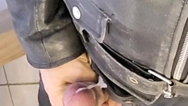 Sandro jerking off and cumming in a full leather outfit with chucks