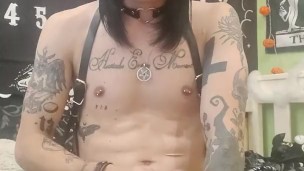 Femboy in lether and wear like sissy whore masturbate a hige dick
