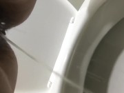 Girl pisses in the toilet at a gas station and shows a pad