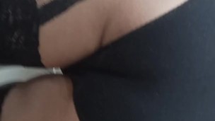 Cute boy tries on new stockings in black panties