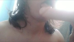 A young guy sucks a phallus