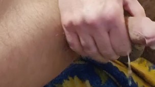 Muscle bear plays with nipples before cumming!