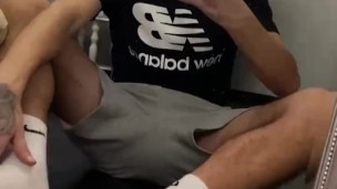 Guy sniffs white Nike socks