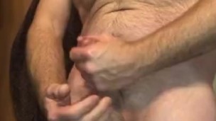 Flexing Muscles While Jerking Off A Huge Cum Shot While Wearing Bikini Bottoms