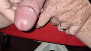 Guy enjoys jerking his cock and cums in his hands