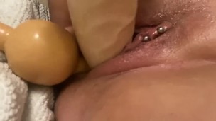 Dirty whore stuffing her pussy
