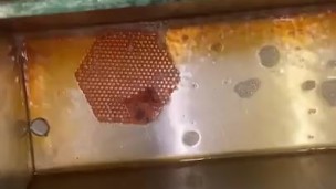 Taking a piss at an old urinal trough
