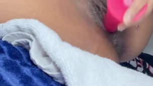 Young ebony squirts all over her bed