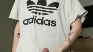 A handsome student came from training and jerks off a dick and cums right on his T-shirt