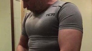 Muscle Daddy with big cock pumps up and flexes his big biceps and cums on compression top