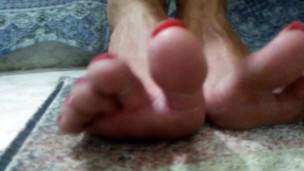 Red long toenails teasing