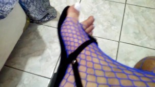 White long toenails and blue fishnets teasing