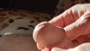 Foreskin play, jerk off and cum.