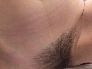 Girl with a very hairy pussy put her leg on the washbasin and pissing in it