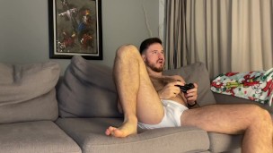Muscular gamer farting on housemate