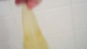 Playing with my piss filled rubber