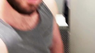 Hairy muscle cub gets shows off his thick cock and meaty ass in the gym showers