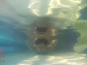 Elegant and flexible babe, swimming underwater in the outdoor swimming pool. 3 2 16/16