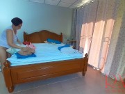 Nudist housekeeper Regina Noir makes the bedding in the bedroom. Naked maid. Naked housewife. c2 8/16