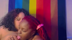 Cute Ebony sucks on her sexy Latina girlfriend‘s juicy tits!