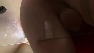 Riding a dildo under the glass