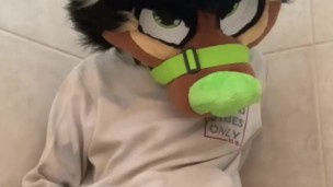 Furry jerks off while pissing ends with big cum shot