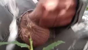 Massive cock out a hole in ski suit and jerk it