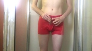 College Twink Pissing in Pink Trunks and Getting Hard