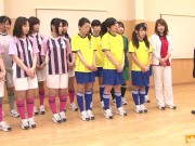 Japanese female team listen and take a lesson from their coach