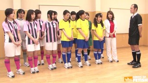 Japanese female team listen and take a lesson from their coach