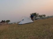 Outdoo in the tent at evening in a peaceful environment 7/16