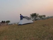 Outdoo in the tent at evening in a peaceful environment 9/16