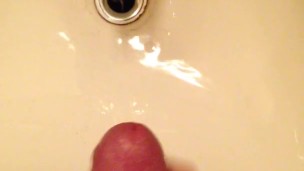 Cumming hard in a public washroom sink at work
