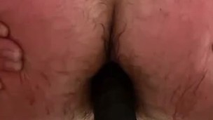 Hairy bottom Riding dildo in shower