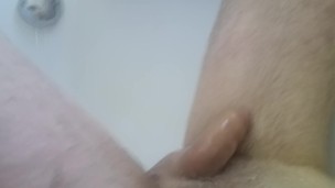 Penis slowly growing hard and big under shower rain