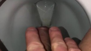 Pissing and cumming into the toilet for you to watch