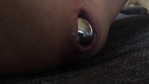 Giant steel buttplug wrong way in ass giving birth