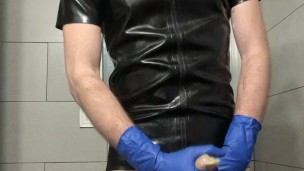 Rubber Boy Jerking Off in Sheath Shorts