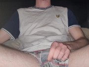 Guy gets horny while smoking so strokes his cock and gets naked 2/16