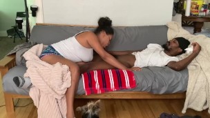 Laying on the couch getting had in the afternoon