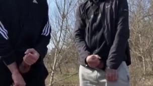 TWO GUYS JERK OFF OUTDOORS