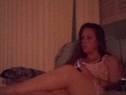 Lonely Milf With Long Brunette Hair and Big Boobs Smoking Cigarettes and Playing Video Games