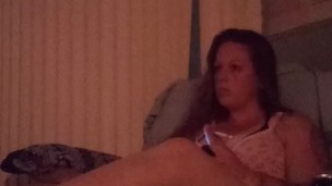Lonely Milf With Long Brunette Hair and Big Boobs Smoking Cigarettes and Playing Video Games