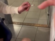 she sucks me while smoking her cigarette and i cum in her mouth at the office